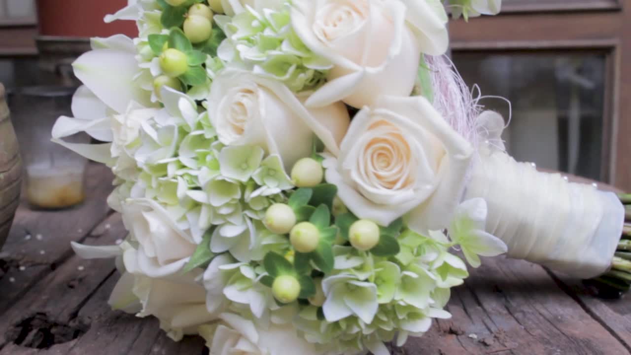 Close-up of a white rose and hydrangea bouquet