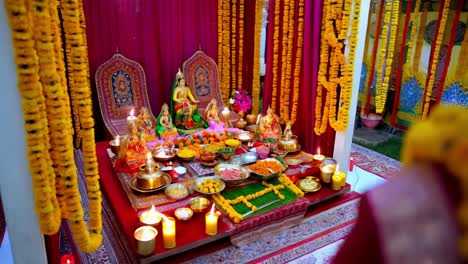 hindu religious ceremony with offerings and decorations