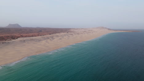 amazing praia de chaves ( chaves beach) popular tourist destination.aerial view of ocean and sandy dune.boa vista island situated in the atlantic ocean. republic of cape verde, africa