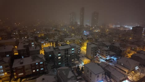 snowy city at night
