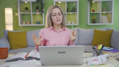 University-student-girl-looking-at-laptop-gets-upset.