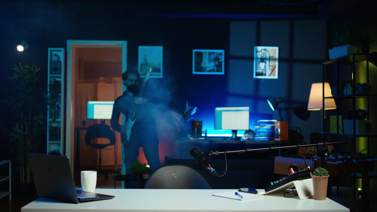 Playful internet star playing guitar in studio