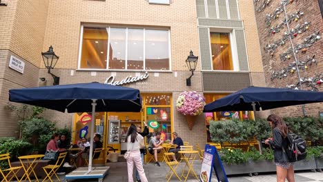 people enjoying a cafe in covent garden