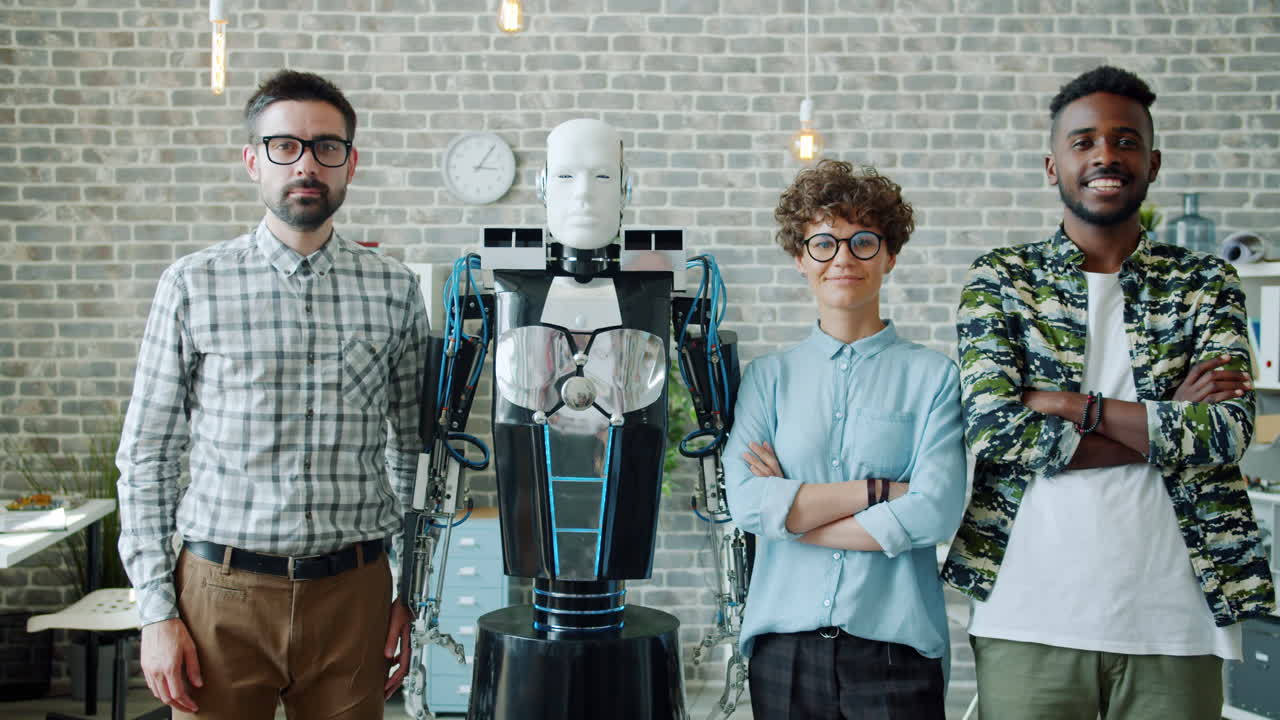 Team Posing with a Robot