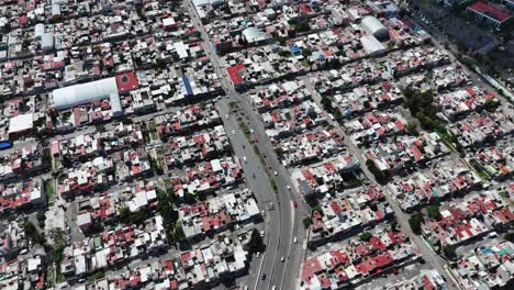 streets of ecatepec seen from a drone, houses and urban life