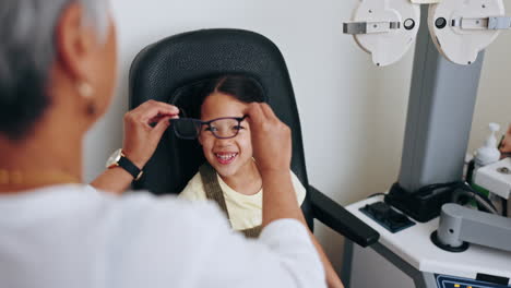 optometrist, child and frame for glasses