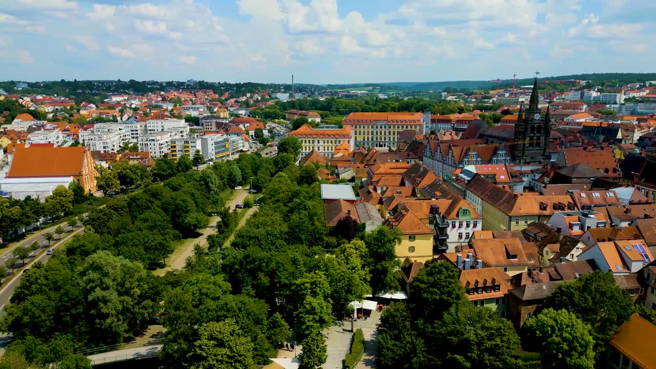 4K Aerial Drone Video of the Spiers and Steeples of St. Johannis Kirche Church and Kirche St. Gumbertus Church in Ansbach, Germany
