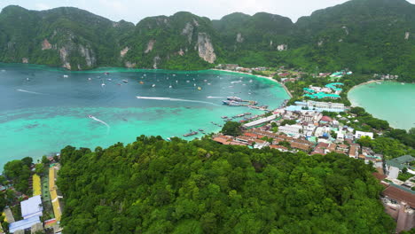 Exotic-township-of-Koh-in-Phi-Phi-island,-aerial-drone-view