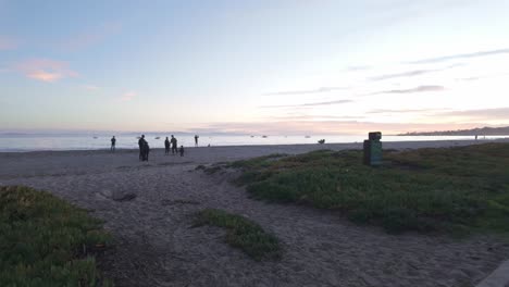 Gimbal wide panning shot of East Beach at sunset in Santa Barbara, California. 4K