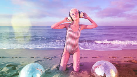 beautiful female dancer in bikini at beach at sunrise