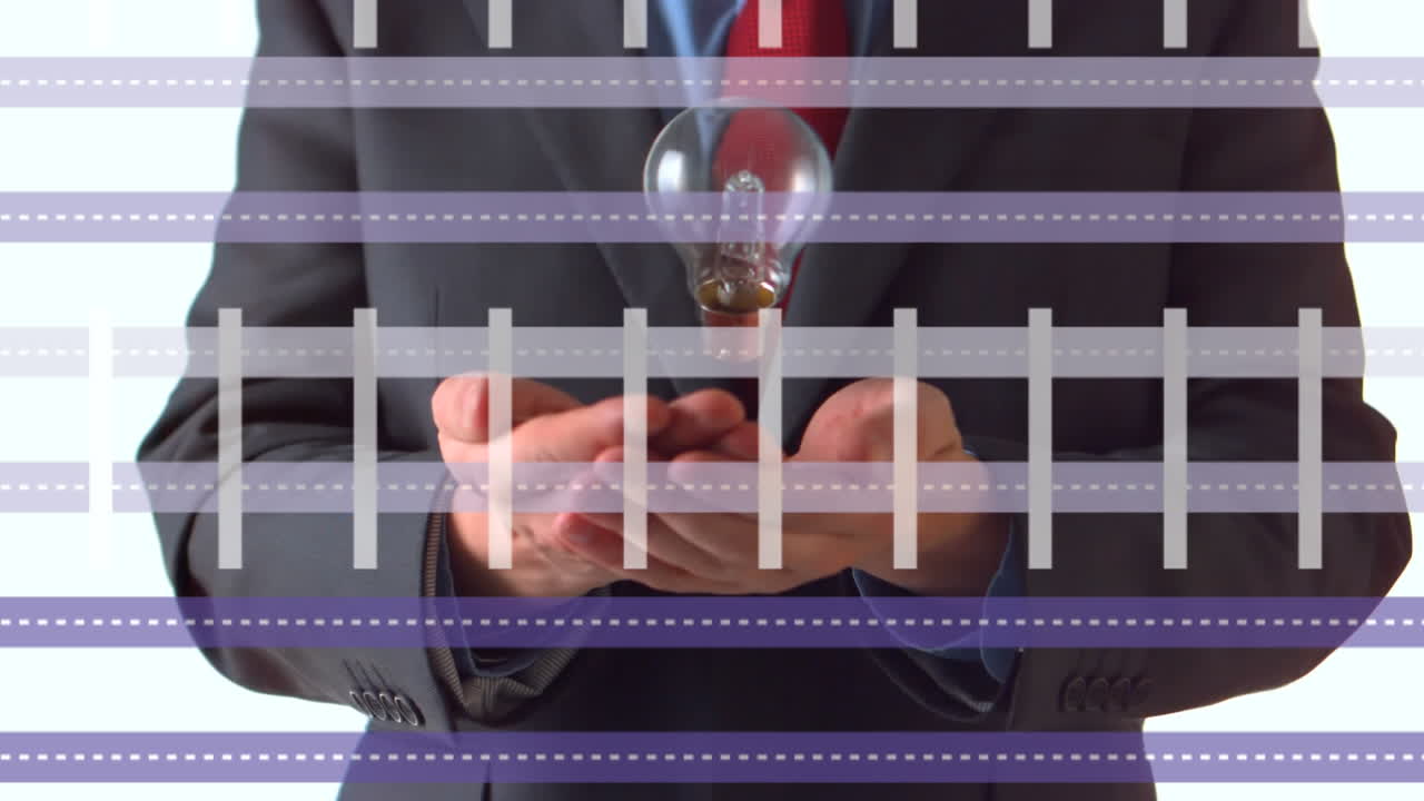 Animation of digital interface over midsection of businessman throwing and catching lightbulb