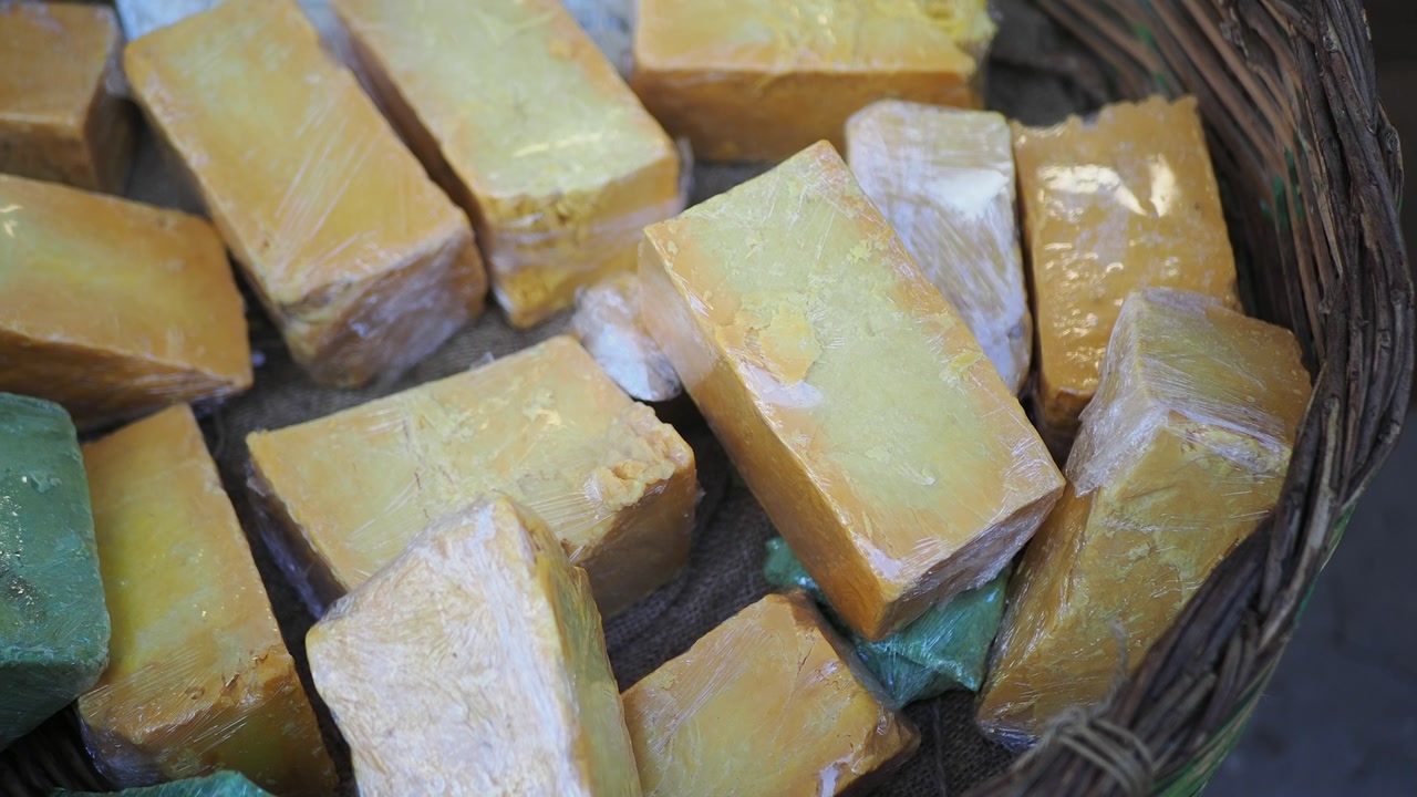 Colorful Handmade Soaps Displayed in a Rustic Basket