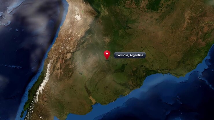 Realistic 3D globe animation zooms from outer space directly to Formosa, Argentina with pin marker. Includes NASA public domain imagery.
