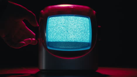 retro tv, vintage television in a nostalgic setup, a retro tv displays grain on screen, scary halloween night device good for chroma key and green screen. high quality 4k footage