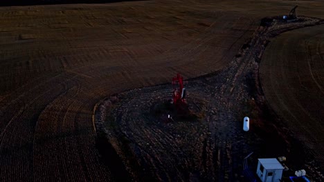 orbiting hyper lapse of an oil pump in canadian countryside