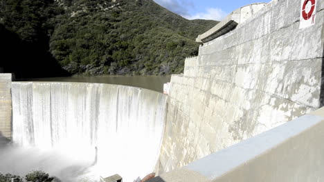 Dolly-shot-of-Matilija-Creek-spilling-over-the-obsolete-Matilija-Dam-after-a-spring-storm-near-Ojai-California-1