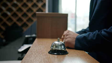 hotel reception desk with bell