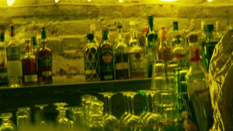 bartender preparing drinks at a bar