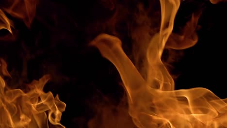 Flames-of-fire-on-black-background-in-slow-motion