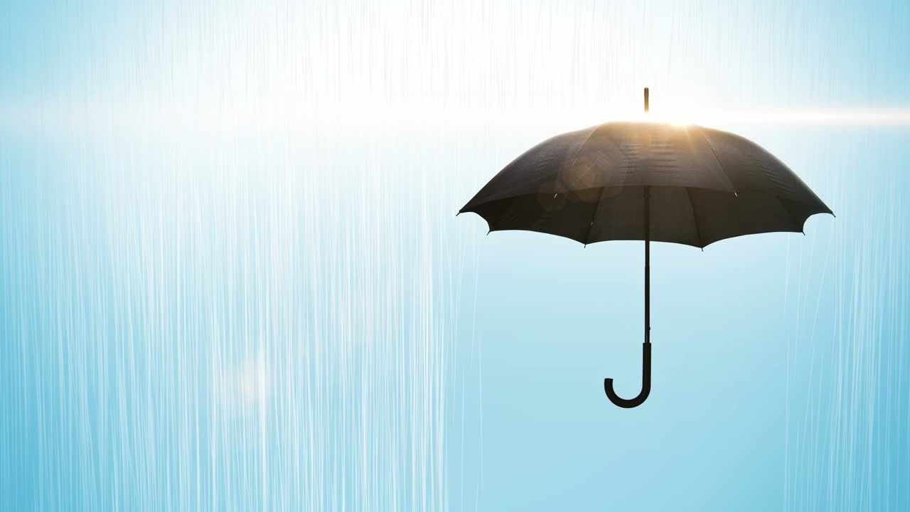 비방울과 렌즈 플레어가 있는 검은색 우산