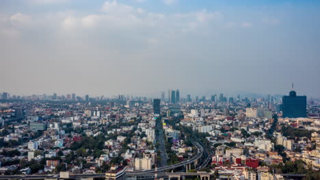 Aerial-hyperlapse-of-Mexico-City-at-day-in-the-San-Antonio-freeway