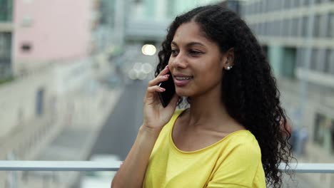 happy woman talking by cell phone