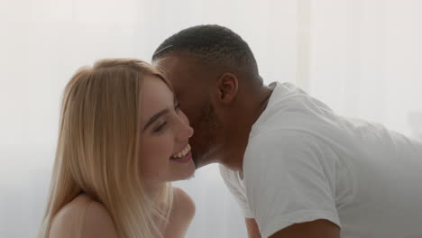 interracial couple kissing