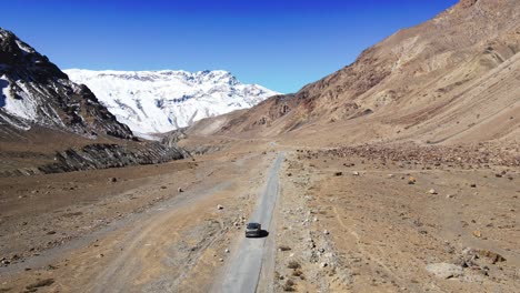 drone following car in spiti valley himachal pradesh sand mountain india