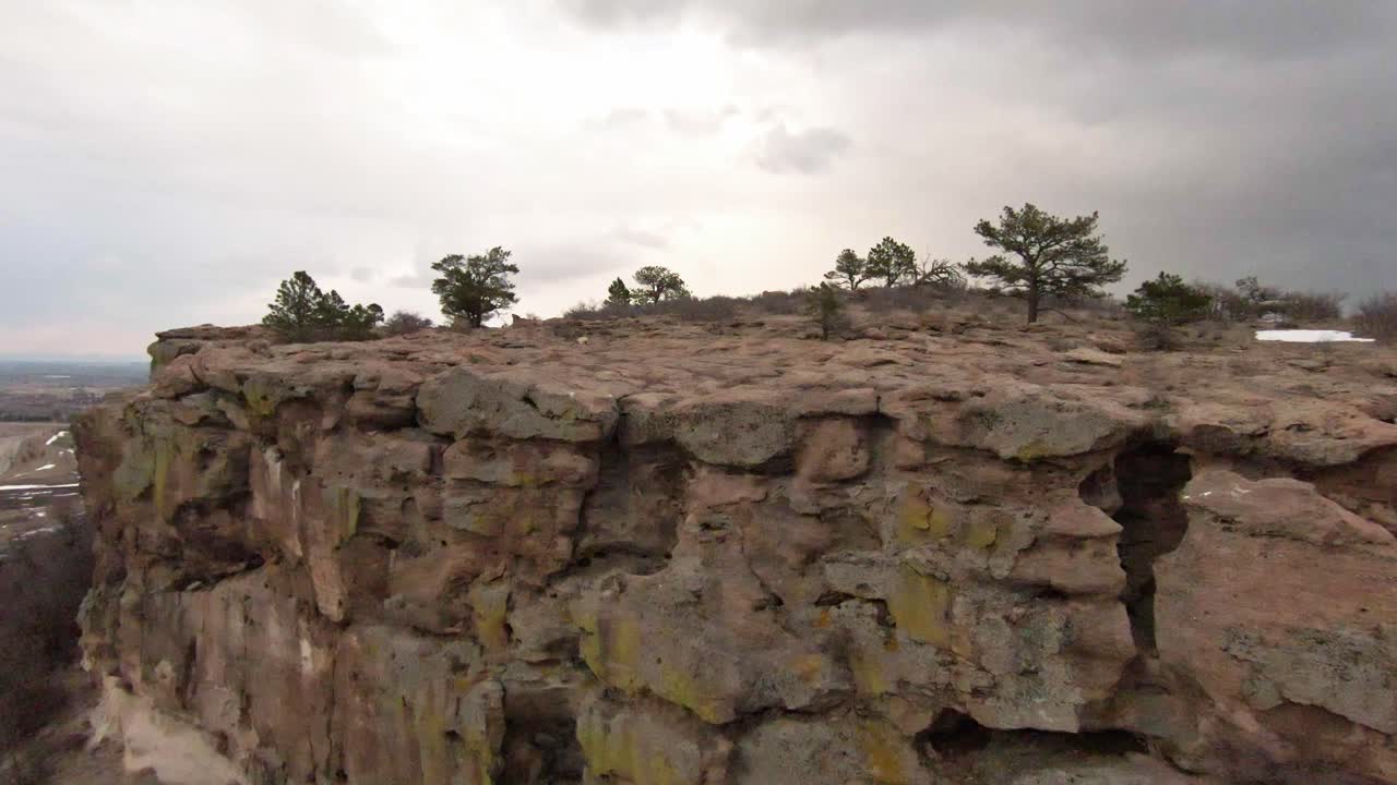 Turning and approaching large rock formation. Capture made with FPV drone.