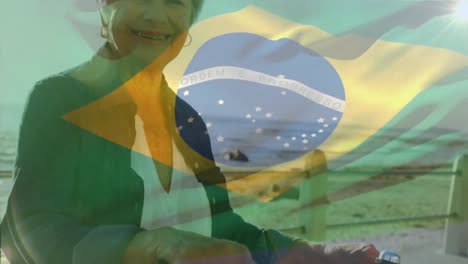 animation of flag of brazil over senior caucasian woman