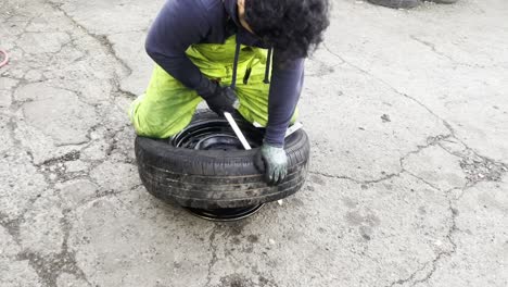 latin man working as a roadside assistance