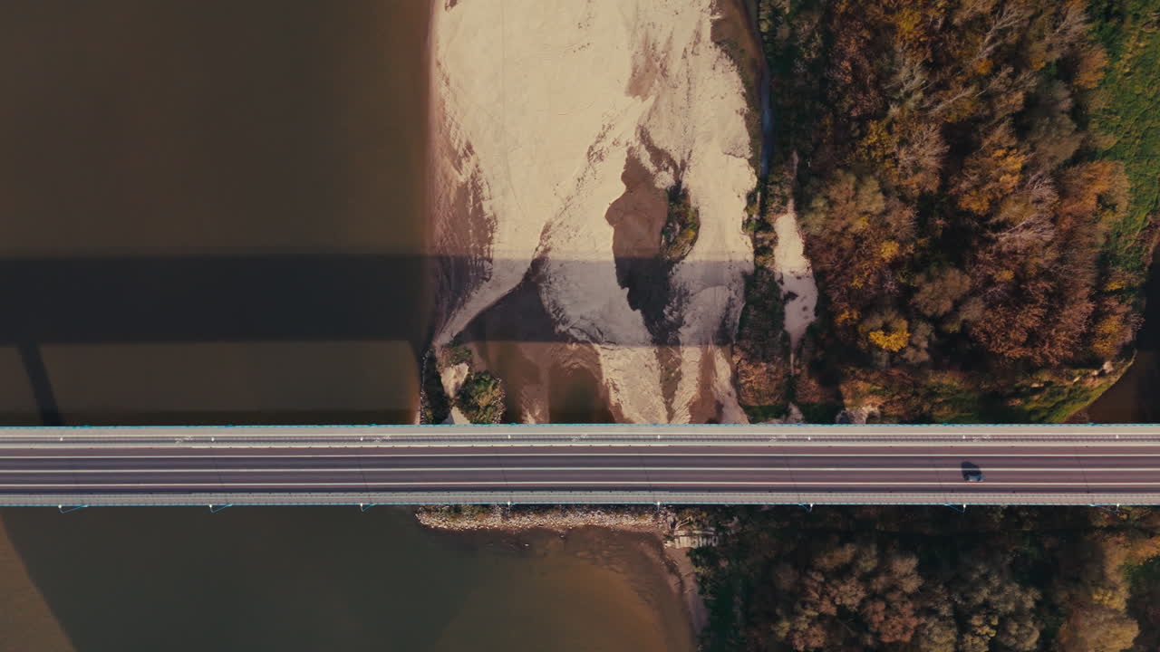 Aerial View of Bridge Over River with Autumn Trees