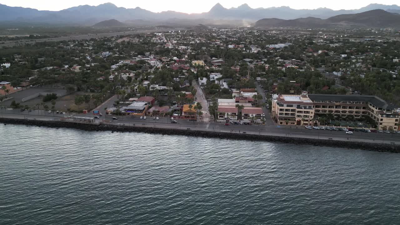 Aerial Drone Panoramic Fly Loreto Baja California Mexico Village Town Sea Coast Seaside destination, Mexican Summer, mountain range background