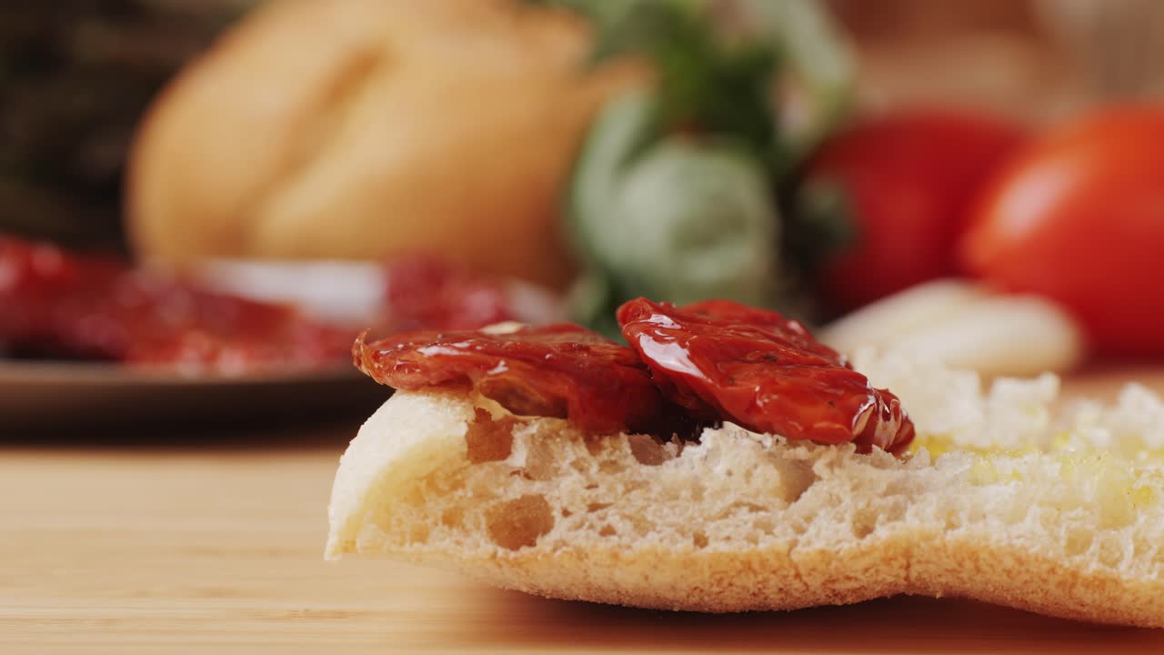 Dried tomatoes close up, Italian restaurant with traditional food, Spanish cuisine, delicious tapas and white wine, bruschetta with cheese, olives dry tomatoes and tasty sandwich bar appetizer, buffet
