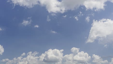 clouds rolling in the bright blue sky -time lapse