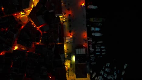 aerial top shot of old town of rovinj at night