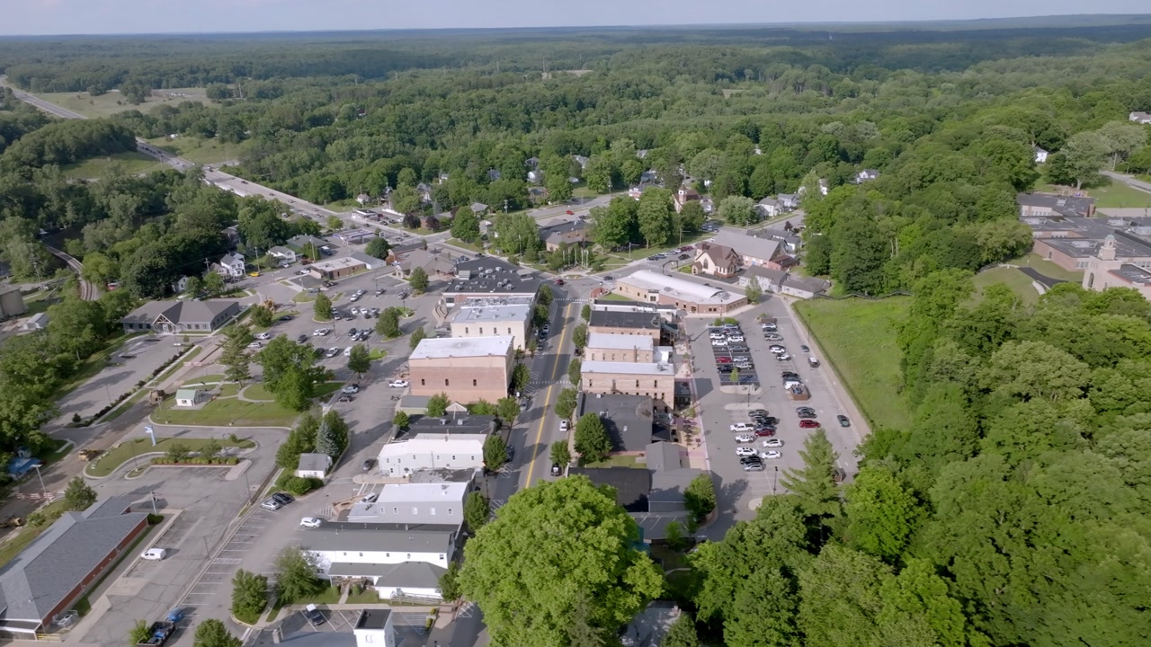 Newaygo, Michigan downtown with drone video moving left to right.