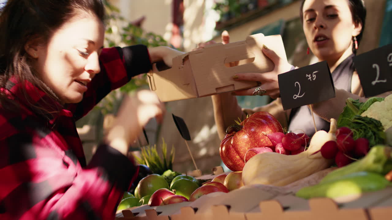 People buying fresh produce at a farmer's market