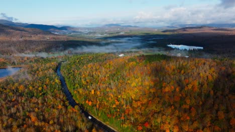 drone footage of peak fall foliage in upstate new york, new england, usa