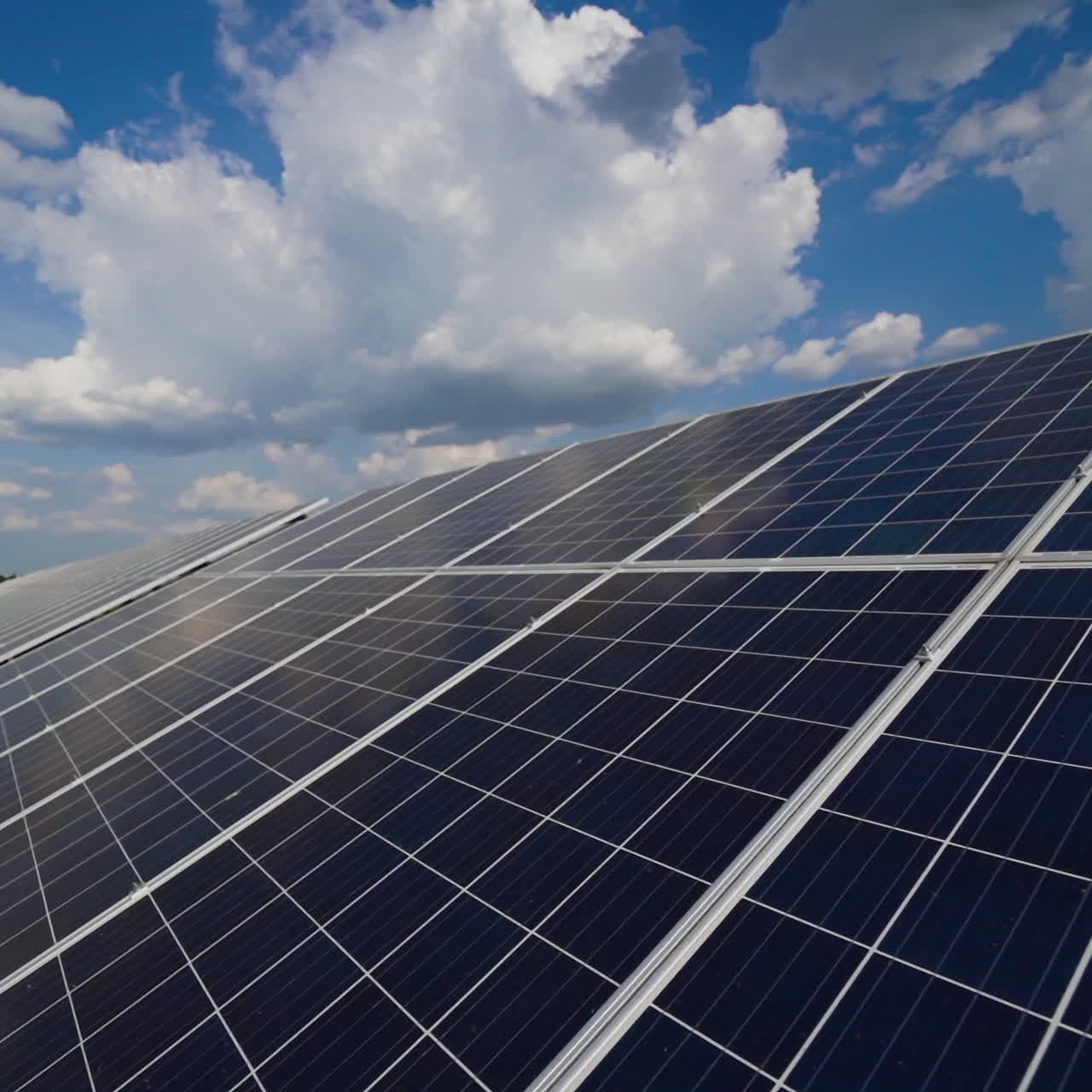 Photovoltaic solar panel on the modern electric power plant. Close view of innovative source of energy. Solar farm. Motion camera back.