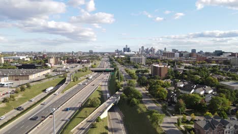 interstate 75 , with the detroit city skyline in the background