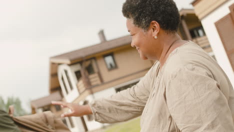 Male-Soldier-Hugging-And-Saying-Goodbye-To-His-Mother-Outside-Home-Before-Going-To-Military-Service