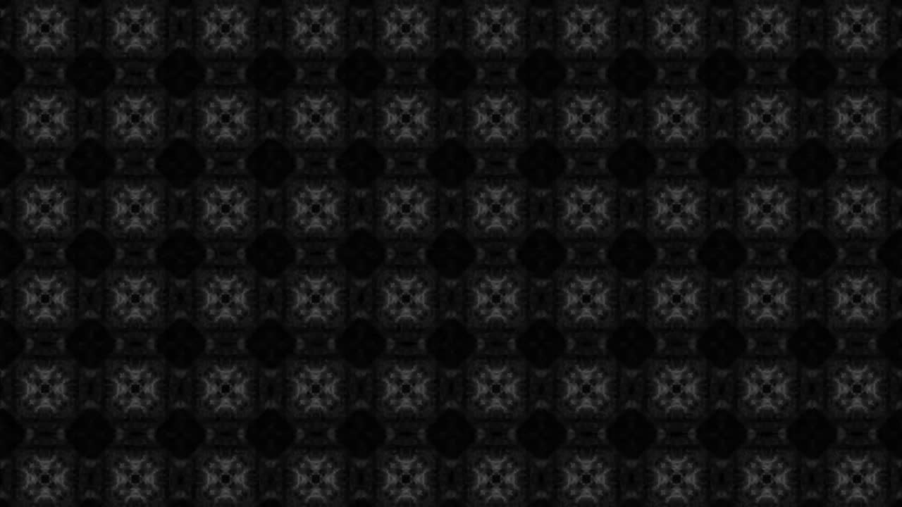 caleidoscopio sobre fondo negro con formas cambiantes animación ahumada