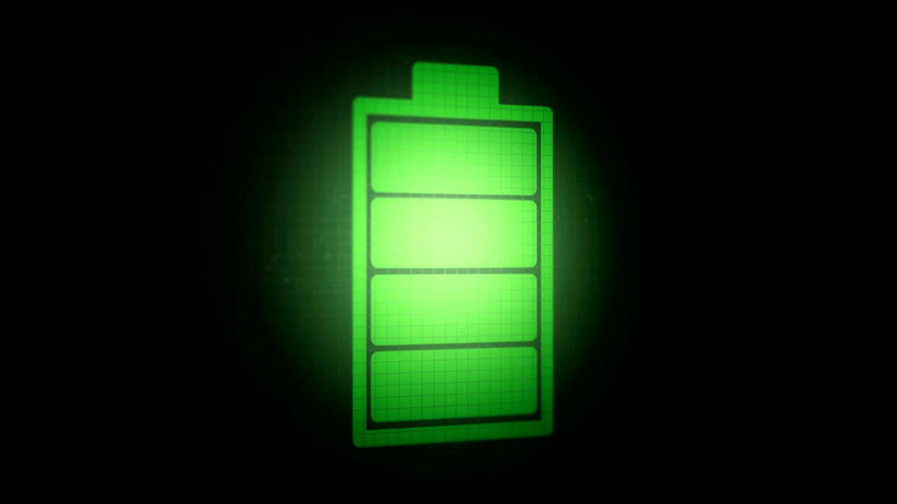 3d animation: animated background with charging battery icon green color on the black pixel screen. Vertical. The camera turns to the right side. zooming. increased.