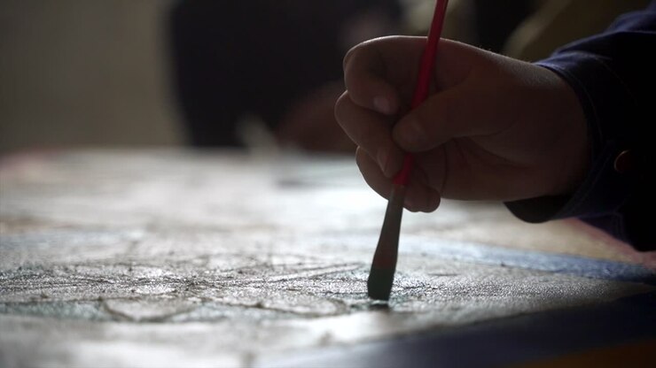 Macro Shot Of Gentle Hand Painting Beautiful Art With Painting Brush