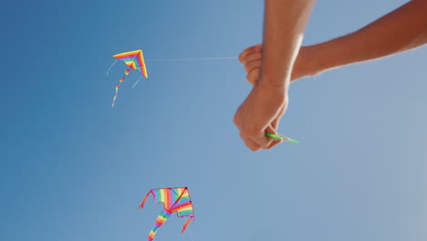 hands of a man control a kite precise control concept