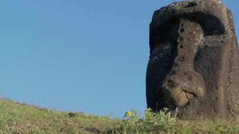 pan to a giant stone carving on easter island