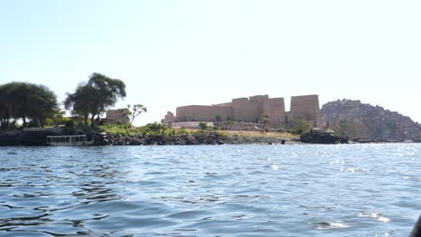 ancient egyptian temple situated on the banks of the nile river in egypt