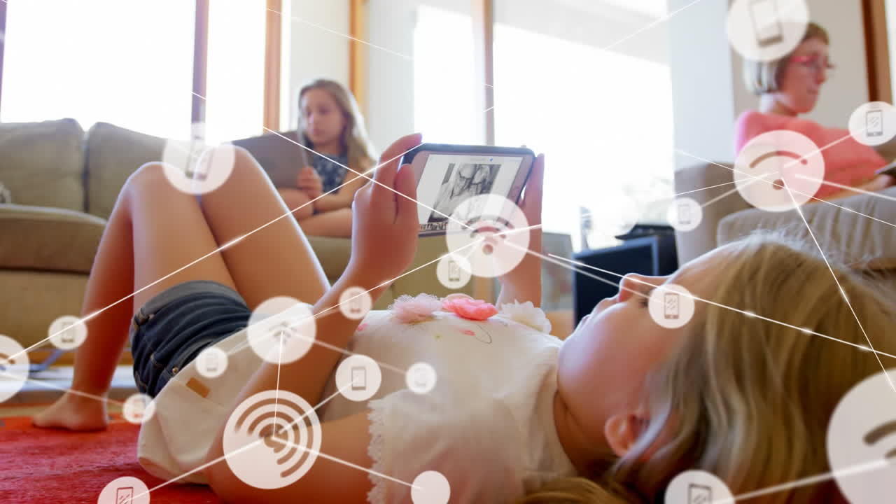 집 바닥에 누워있는 디지털 태블릿을 사용하는 백인 소녀에 대한 아이콘 네트워크의 애니메이션