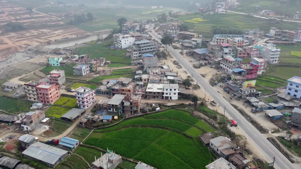 An aerial view of a rural town in the hills of Nepal